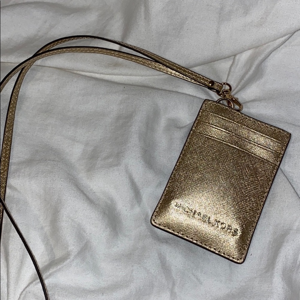 brand new gold Michael Kors lanyard